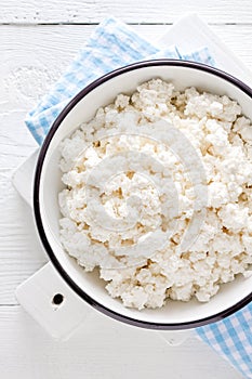 Cottage cheese, curd on white wooden rustic table