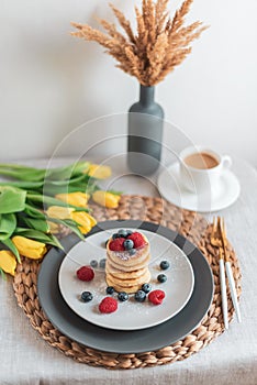 Cottage cheese pancakes with berries, healthy breakfast
