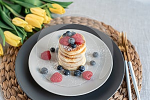 Cottage cheese pancakes with berries, healthy breakfast