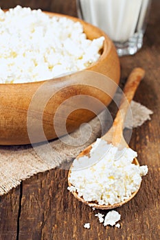 Cottage cheese in a wooden bowl