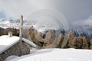 Cottage covered with snow in Dolomites ,Italy