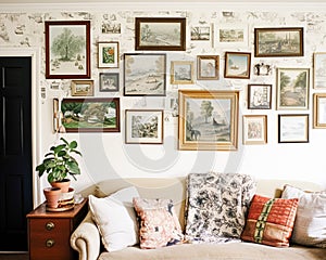 Cottage gallery wall, wall art, home decor and framed art in the English country house interior with antique furniture