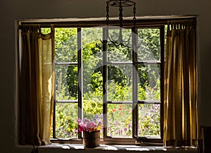 Cottage garden of small brick home