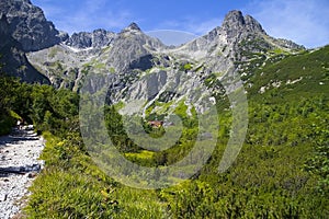 Cottage by the Green lake in the Valley of the Green lake with Tatra peaks - Jastrabia tower, Kolovy shield, Karbunkulovy ridge,