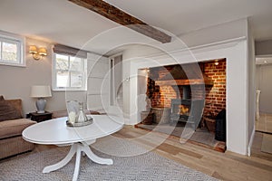 Cottage living room with fireplace and stove