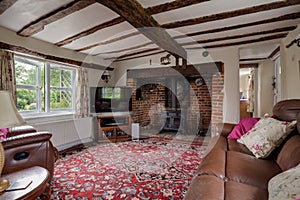 Cottage living room with woodburning fire