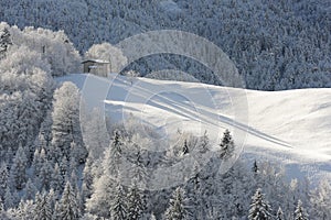 Cottage in the mountains in snow