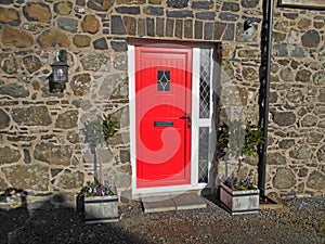 Cottage with red door photo