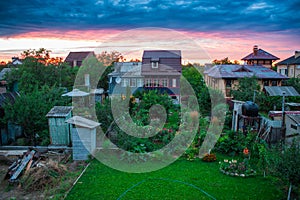 Cottages on the sky background