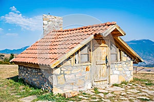 Cottages in the woods. Wooden houses on the top of the mountain. Cottages for recreation in nature. Small huts