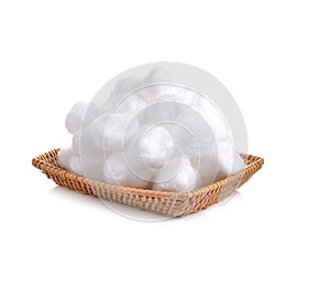 Cotton ball in bamboo basket on a white background.cotton ball for skin care and medical line