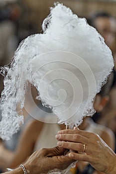 Cotton candy, candy floss and fairy floss surved at social event to kids