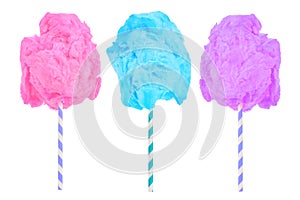 Cotton candy in pink, blue and purple colors isolated on white