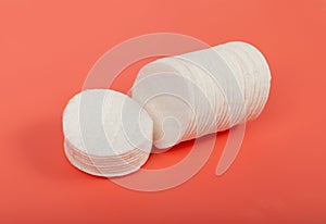 Cotton Disks, Hygiene Pads on Pink Background, Round Facial Sponge, Soft Clear Disk Stack