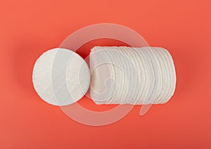 Cotton Disks, Hygiene Pads on Pink Background, Round Facial Sponge, Soft Clear Disk Stack