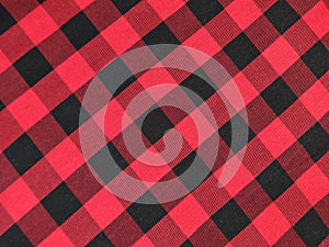 Cotton fabric in a black and red checkered photo