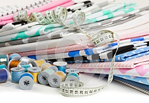 Cotton fabric material, tailor measurement tape and spools of co