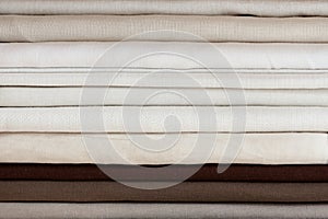 Cotton fabrics in rolls, natural linen colors,   fabric manufactory or shop for curtains and home textiles