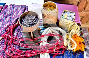 Cotton fibers and lac for dyeing ancient cloth of Tai Khrang people at Ban Ko Noi, shown in Tai Khrang Museum