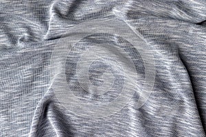 Cotton jersey fabric texture. Crumpled gray textile background