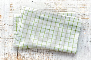 Cotton napkin on white wooden table