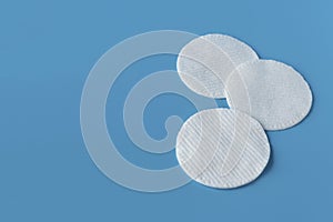 Cotton pads for skin care, for cleansing the face of cosmetics with tonic or micellar cleansing water. Cosmetic products.