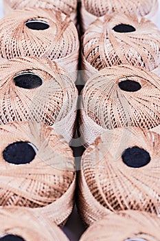 Cotton spool on rows in the store