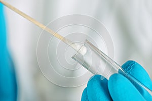 Cotton swab and DNA test tube macro