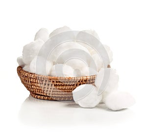 Cotton swabs in basket isolated white background