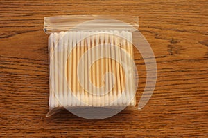 Cotton swabs on wooden shafts in packet