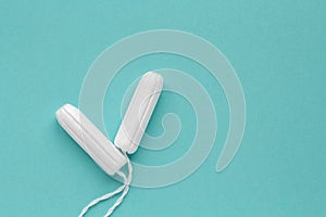 Cotton tampons on medical background. Copy space.