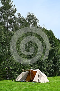 Cotton tent on a camping site