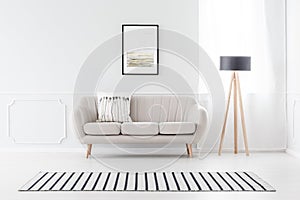 Couch against wall with molding