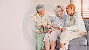 Couch, friends and senior women in conversation in a living room together talking, laughing and bonding on retirement