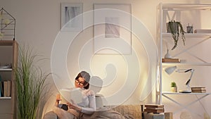 couch reading cozy leisure home relaxing woman