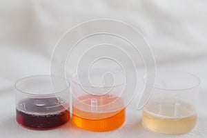 Cough Syrup in Plastic Dose Containers