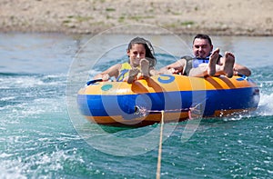 Couiple on water attractions during summer vacations