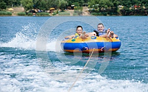 Couiple on water attractions during summer vacations