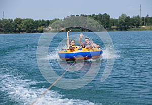 Couiple on water attractions during summer vacations