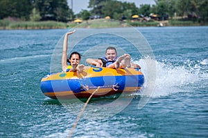 Couiple on water attractions during summer vacations