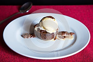 Coulant. Molten chocolate cake is a popular dessert that combines the elements of a flourless chocolate cake and a soufflé.