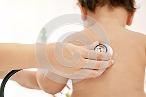 Could it be a chest infection. Closeup shot of a paediatrician using a stethoscope during a babys checkup.