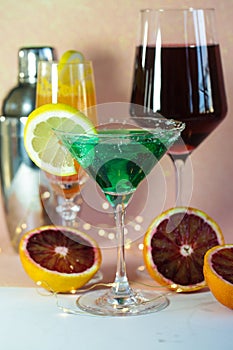 coulorful cocktails with lights in background