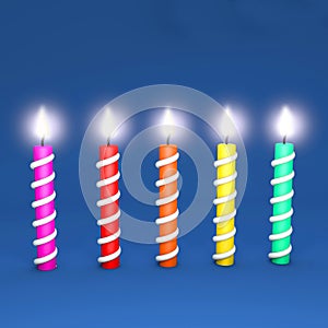 Couloured candles on ablue background, congratulations