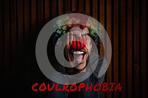 Coulrophobia concept. Double exposure of scared girl and clown