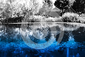 Counrtyside lake with dramatic reflections background