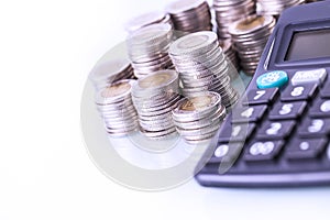 Couns and calculator on white background