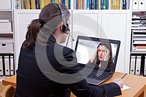 Counselor headset online call patient photo