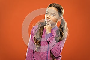 Count in mind. Kid thoughtful face make decision. Child cute pensive face thinking. Girl casual look make hard decision