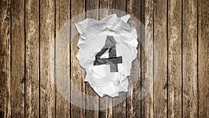 Countdown numbers on crumpled paper